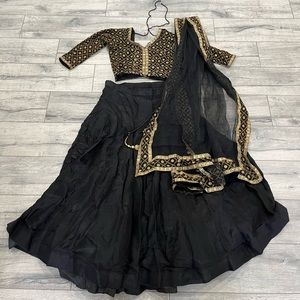 Black and gold lehenga